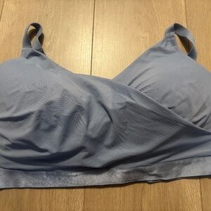 Never worn beautiful blue cross over bra size 44DD